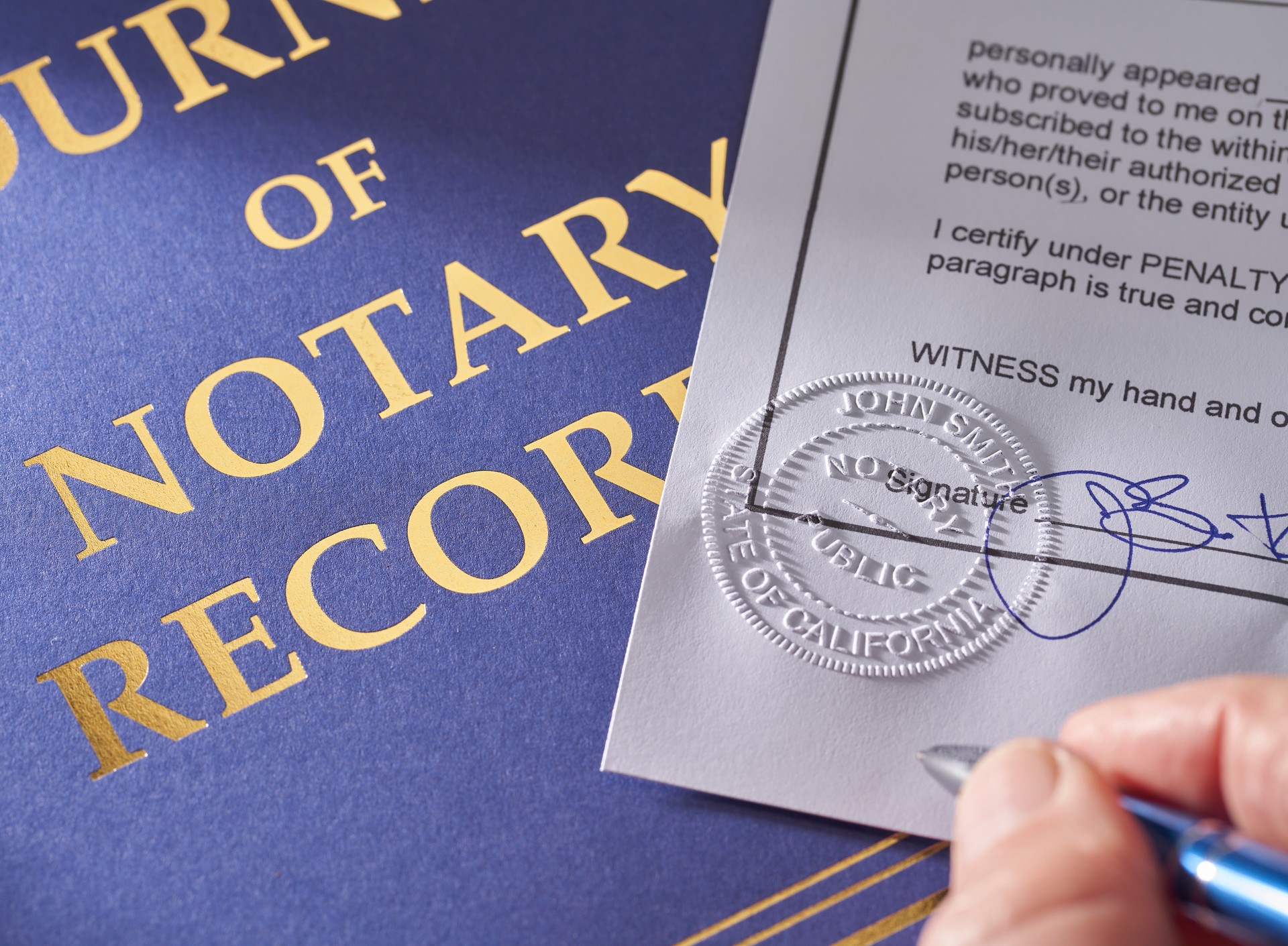 Notary Public: Seal embossed on document with pen and journal